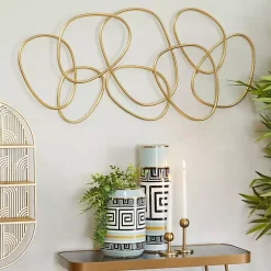 Kirklands Home Abstract Rings Metal Wall Plaque Gold