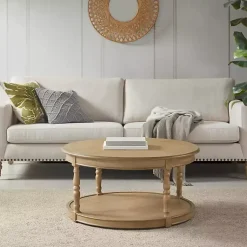 Kirklands Home Natural Wood Finish Turned Leg Round Coffee Table Clearance