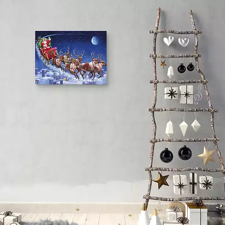 Christmas Art & Wall Decor>Kirklands Home Santa's Flying Sleigh Canvas Art Print Blue