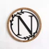 Kirklands Home Wood and Metal Laurel N Plaque Online